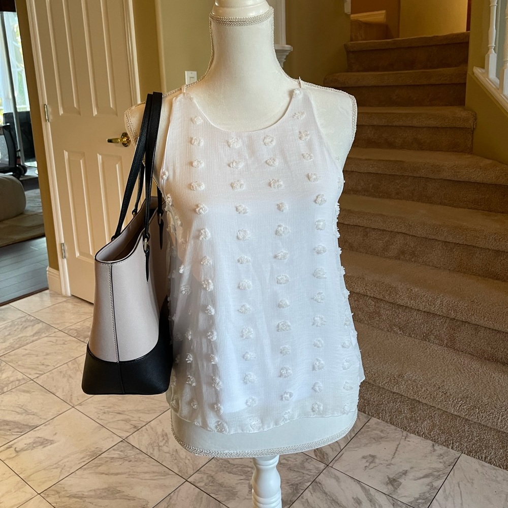 White sleeveless top